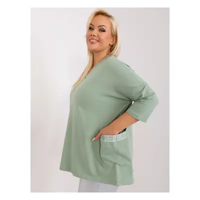 Pistachio women's blouse in a larger size with pockets