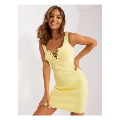 Light yellow minidress with tie at neckline