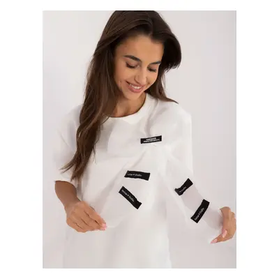 Ecru formal blouse with bow and inscriptions