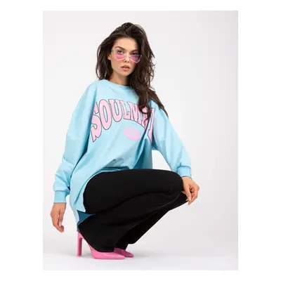 Light blue and pink sweatshirt with colorful print