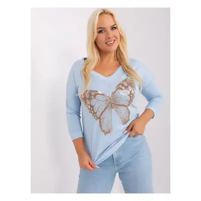 Light blue oversized women's blouse with cuff