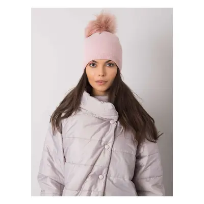 Light pink winter hat with pompoms