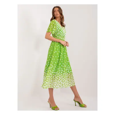 Light green women's polka dot dress with belt