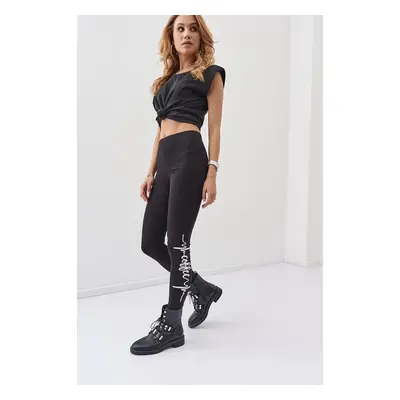 Fashionable black sports leggings with slogans