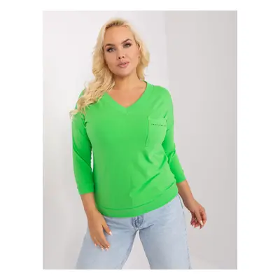 Light green cotton blouse of larger size