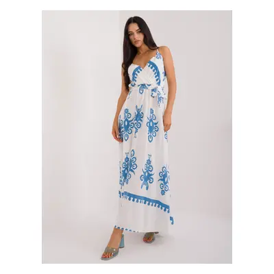 Blue and white flowing dress with patterns