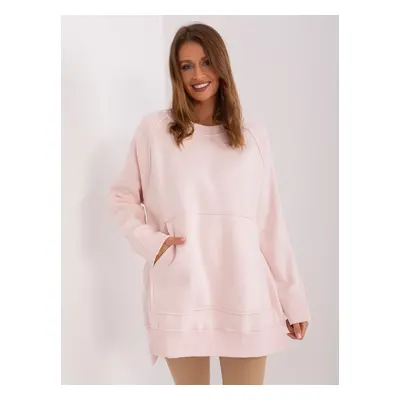 Light pink women's sweatshirt with slits