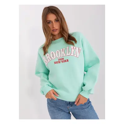 Mint women's hooded sweatshirt with inscription