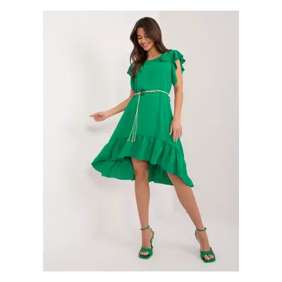 Green dress with ruffles and flower