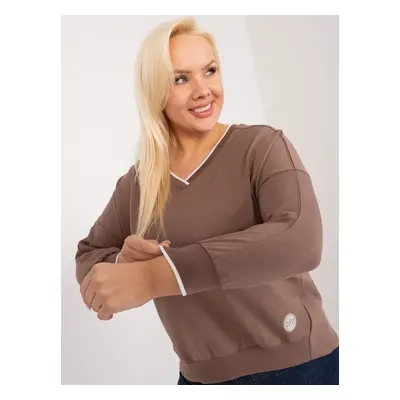 Brown blouse of a larger size with cuffs