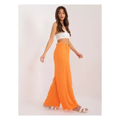 Orange trousers made of straight fabric