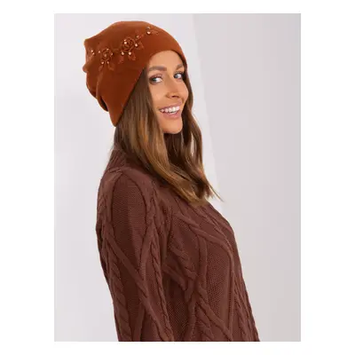 Light brown women's beanie with appliqué