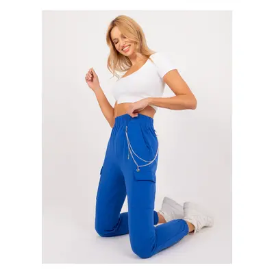 Cobalt blue sweatpants with an elastic waistband