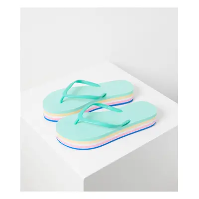 Turquoise women's flip-flops on the CAMAIEU platform