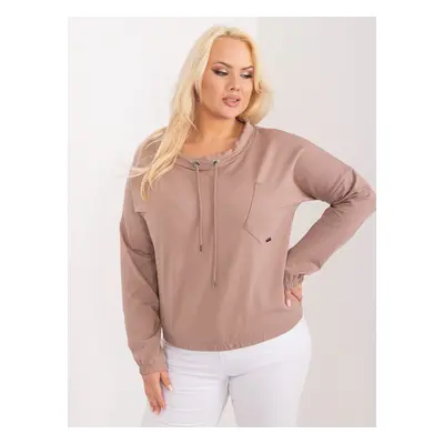 Light brown solid color blouse of a larger size with a pocket