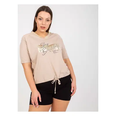 Beige blouse in larger size with print and appliqué