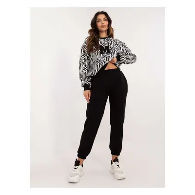 White and black women's tracksuit