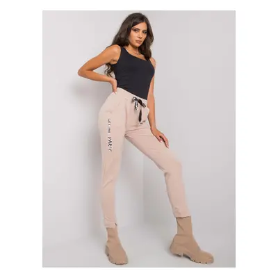 Women's beige sweatpants made of cotton