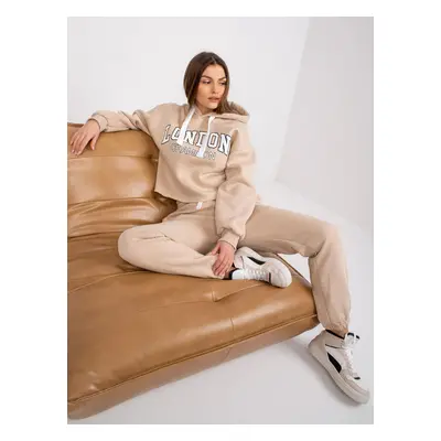 Beige tracksuit with Laraina inscription