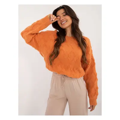 Orange oversize sweater with round neckline