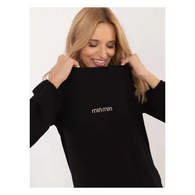 Black blouse with long sleeves and round neckline