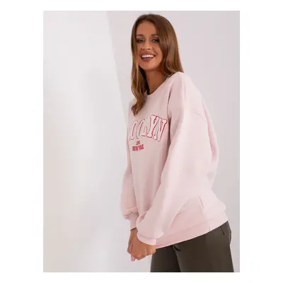 Light pink oversize sweatshirt with inscription