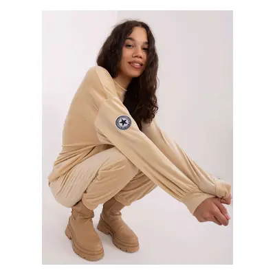 Beige women's velour set with trousers