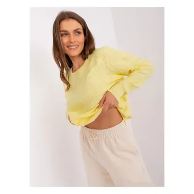 Light yellow women's classic sweater with long sleeves