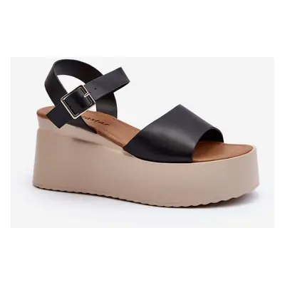 Women's black Geferia wedge sandals