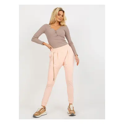 Peach baggy sweatpants with zipper