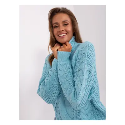 Light blue oversize sweater with cables