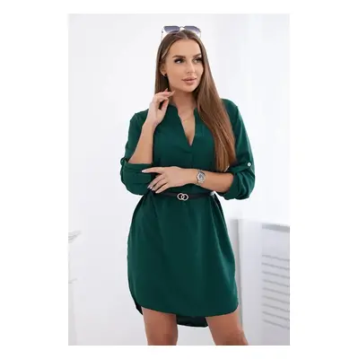 Dress with a longer back and a belt of dark green