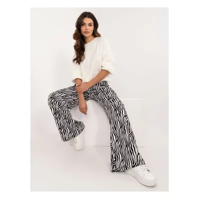 White and black wide trousers with a zebra print