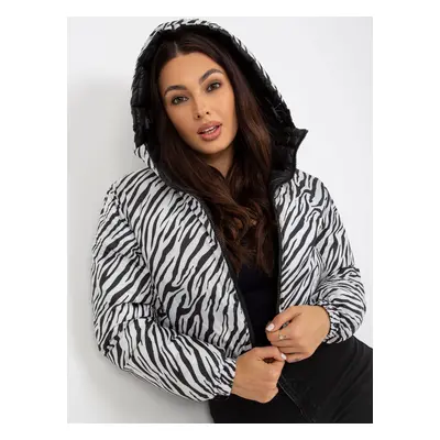 Black, reversible quilted jacket with animal print