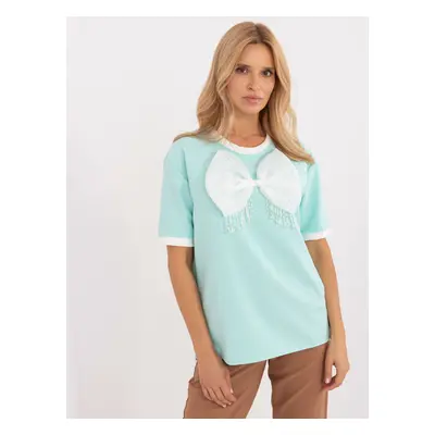 Elegant mint blouse with bow