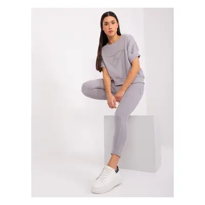 Grey women's tracksuit with patch and insulation