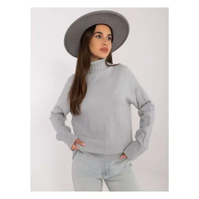 Grey loose turtleneck sweater with patterns