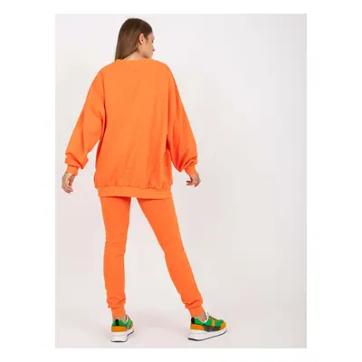 Orange tracksuit with patches