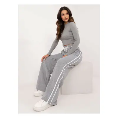 Grey tracksuit with fitted blouse