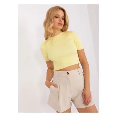 Light yellow short ribbed blouse