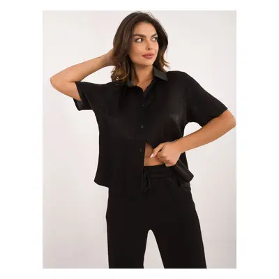 Black glossy two-piece set with trousers