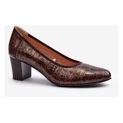 Pumps with embossed brown tin