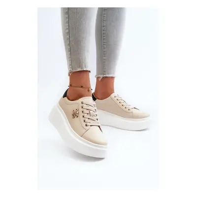 Women's leather sneakers on a beige Pernalia platform