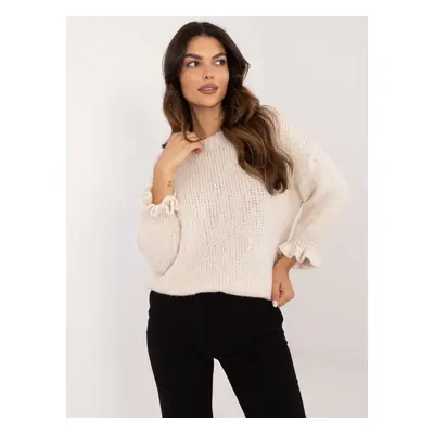 Light beige oversize sweater with long sleeves