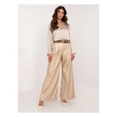 Beige wide trousers made of eco-leather with pleats