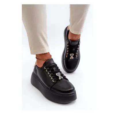 Women's leather sneakers on a black Vinceza platform