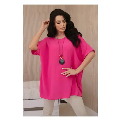 Oversized blouse with a pendant in pink color