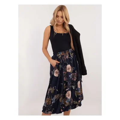 Dark blue midi skirt with a floral print