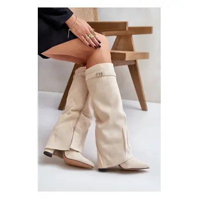 Heeled boots with bent shaving insulated light beige urelli