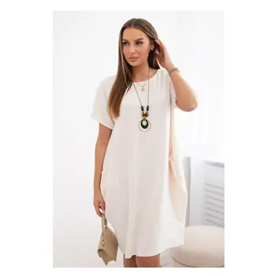 Dress with pockets and pendant light beige